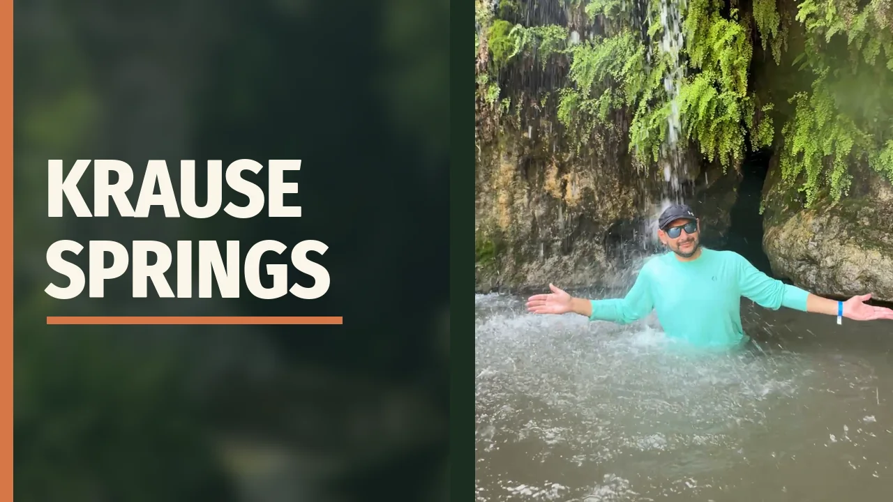 Jose standing beneath the waterfall at Krause Springs
